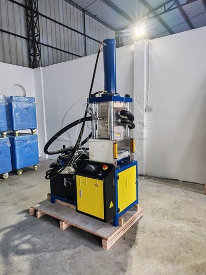 SL-120 dry ice block making machine in a factory setting
